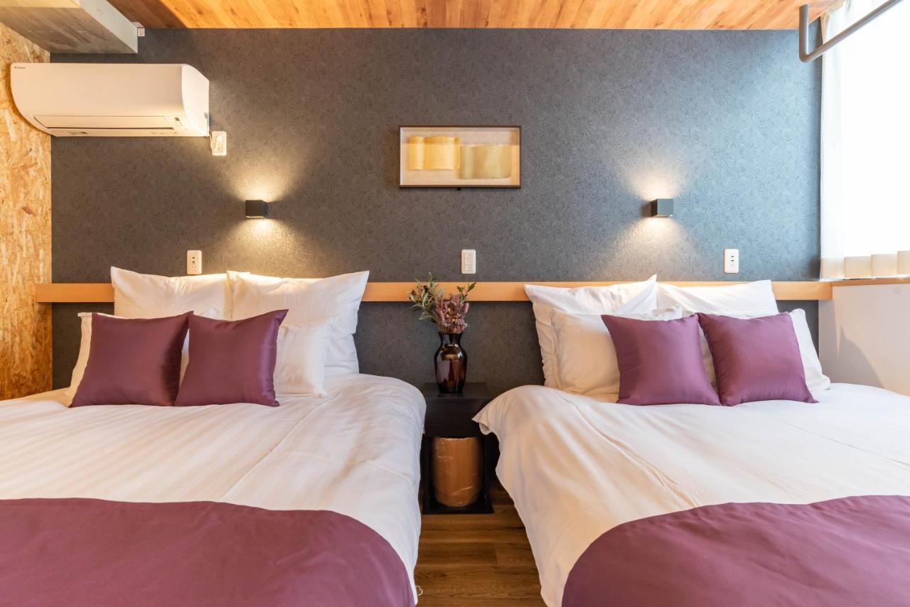 Alla Scuderia Bijou Suites Osaka Bagian luar foto