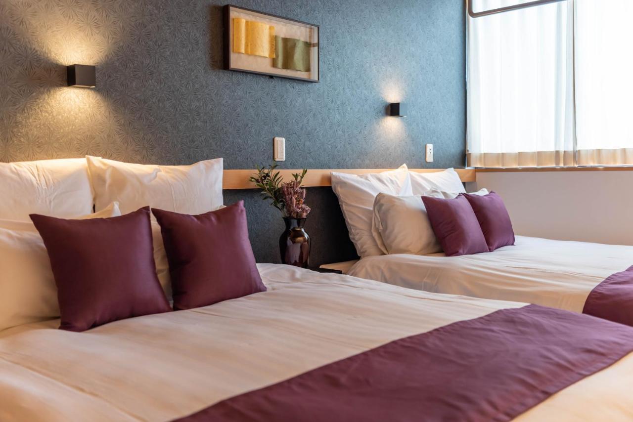 Alla Scuderia Bijou Suites Osaka Bagian luar foto