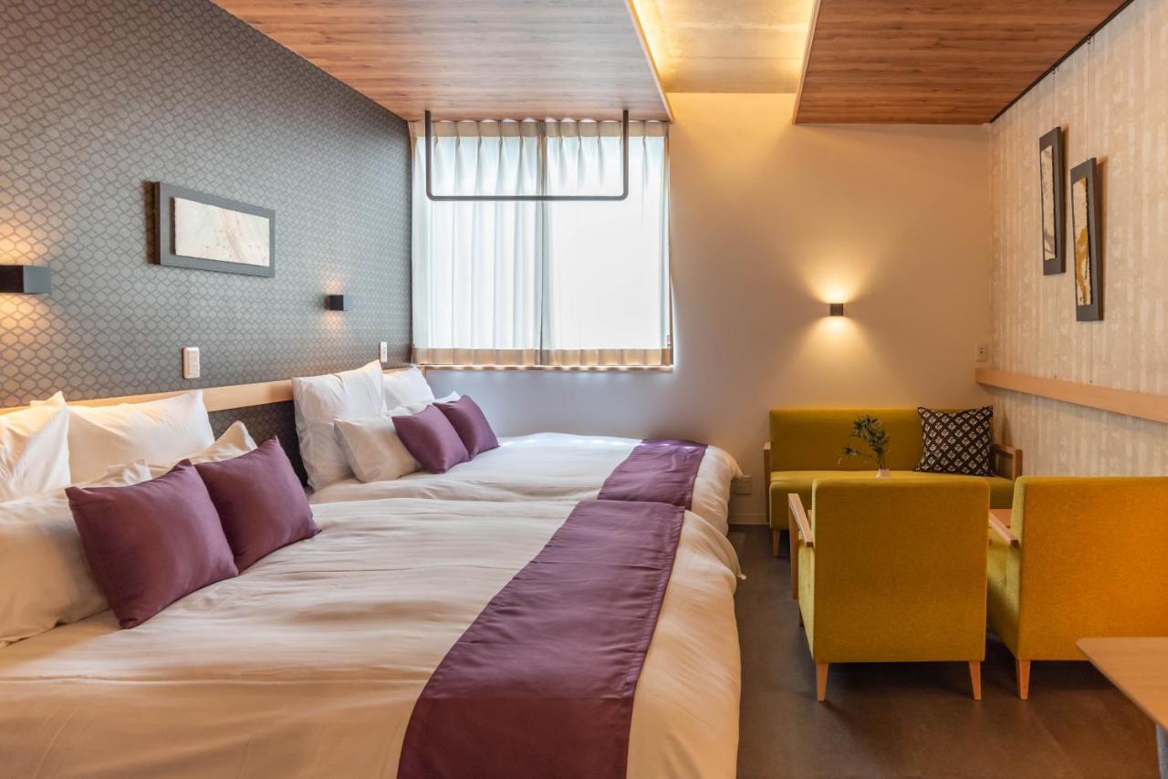 Alla Scuderia Bijou Suites Osaka Bagian luar foto